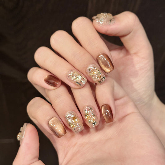 "Premium Brown Gold Foil Ballerina Short Nails - Luxurious Clear Design with Metallic Embellishments and Transparent Beauty