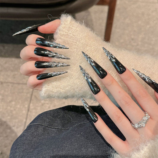 Black chrome stiletto nails