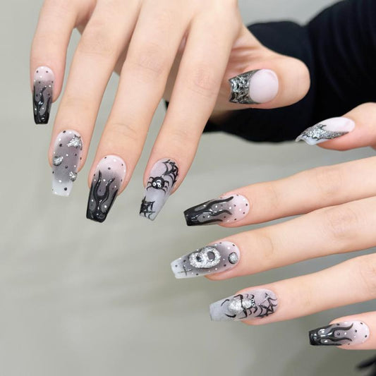Dramatic Halloween gothic flame coffin medium press-on nails with fire patterns, crystal embellishments, and mystical gothic symbols