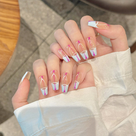 Elegant stiletto long nails featuring sophisticated French gradient design, seamless color transitions and sparkling rhinestones