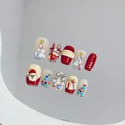 Festive coffin short press-on nails with 3D Santa, gifts, ornaments & colorful lights - perfect for Christmas parties & holiday celebrations
