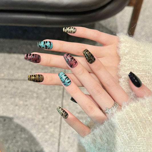 Handcrafted Halloween nails featuring mesmerizing holographic effects, mummy wrapping designs - coffin medium shape collection