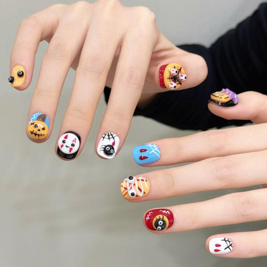 Handcrafted Halloween nails featuring vibrant character artwork, kawaii style designs - squoval short shape for playful style