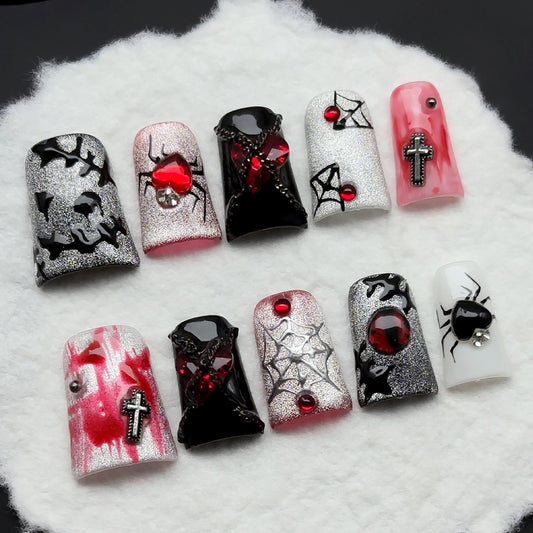 Handcrafted luxury Halloween nails featuring Swarovski-style crystals, gothic crosses, chains - unique duck shape for distinctive style