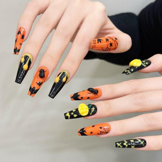 Mystical Halloween witch pumpkin coffin long press-on nails with dramatic witch silhouettes, glowing pumpkins, and magical spider designs