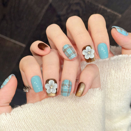 Nostalgic squoval false nails featuring tartan-inspired plaid, soft blue, warm brown & dimensional floral - cottage-core 10-piece set