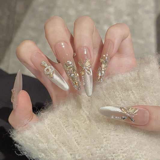 KAPOWNAILS Luxury Press-On Nails – Gold Embellished Long Stiletto with Rhinestones & 3D Bows
