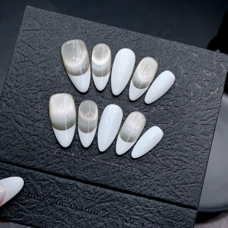Premium handmade almond press-on nails with minimalist design in classic white & nude tones with subtle shimmer finish