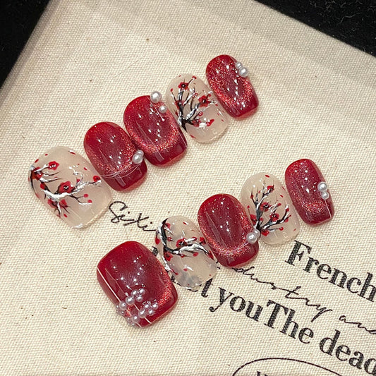 Premium handmade squoval short press-on nails with cherry blossom design, burgundy glitter & elegant pearl accents