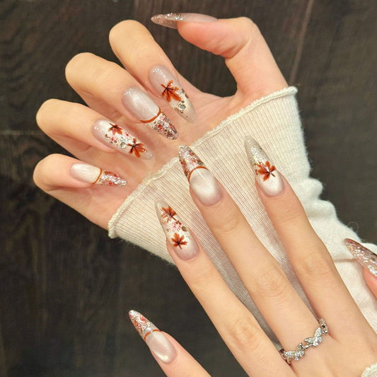 Romantic autumn almond false nails featuring watercolor leaf art, gradient sparkle & burgundy accents - handcrafted 10-piece set
