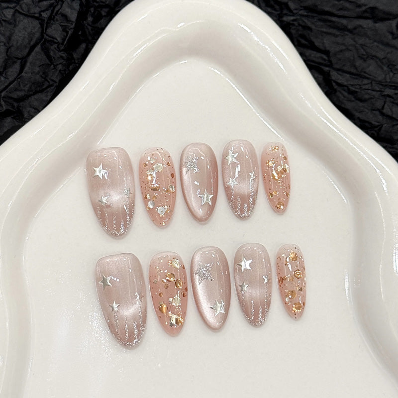 Salon-quality almond press-on nails with cosmic star theme - perfect blend of elegance & celestial sophistication" Key
