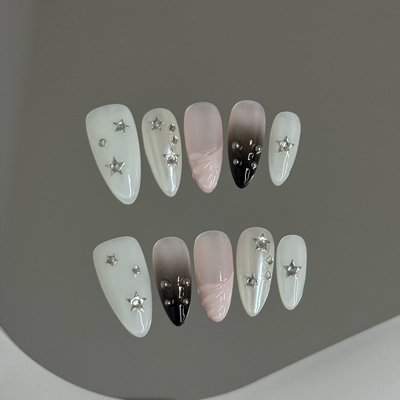 Salon-quality almond press-on nails with edgy design - perfect blend of elegance & rebellious style with 3D elements