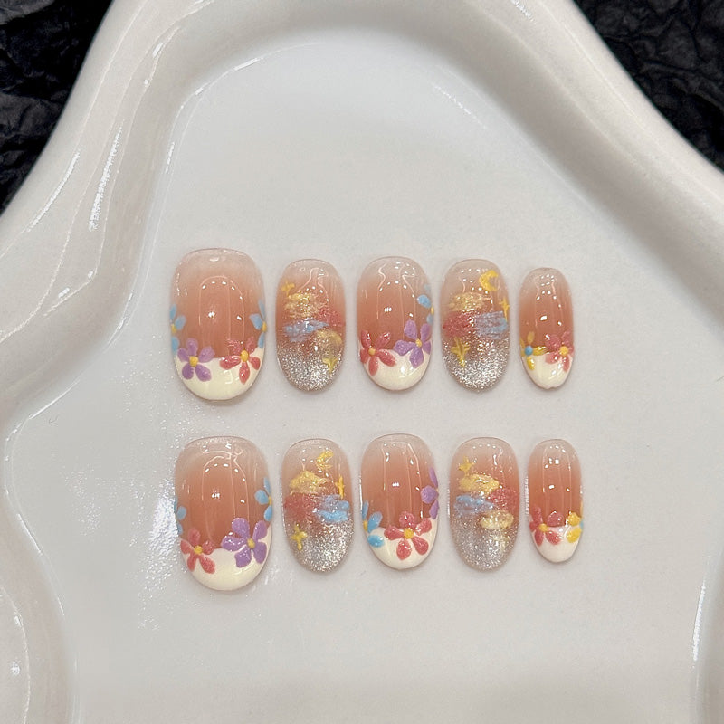 Salon-quality oval short press-on nails with blooming floral theme - perfect blend of nature & artistic elegance