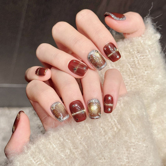 Stunning squoval press-on nails featuring wine red, champagne gold gradient & star charms - Salon glamour at home - Set of 10 nails