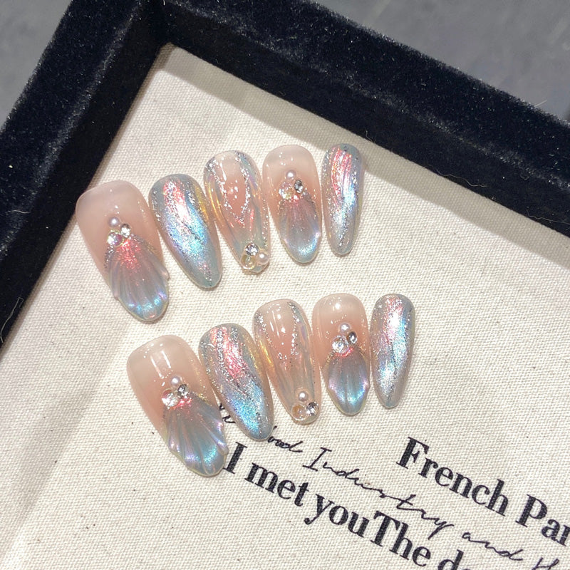 Transform your look with these stunning almond-shaped press-on nails in French gradient with chrome finish