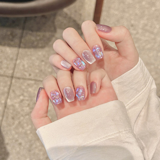 Premium handmade ballerina short press-on nails featuring stunning holographic glitter effects. Lavender base with iridescent shimmer creates magical color-shifting beauty