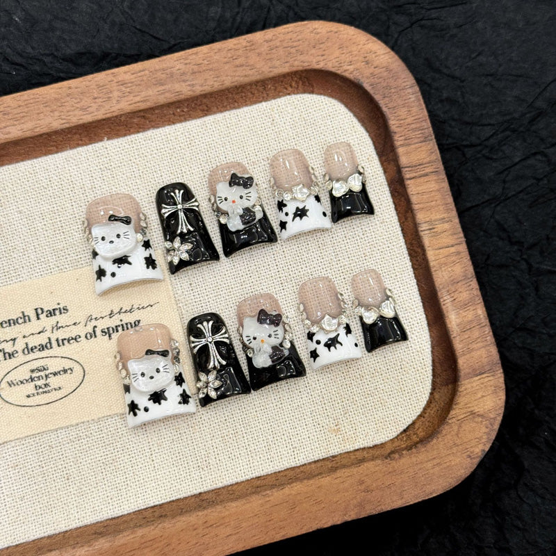 Stand out with our handmade Black White Cat Cross Gothic Kawaii Flare Press On Nails.