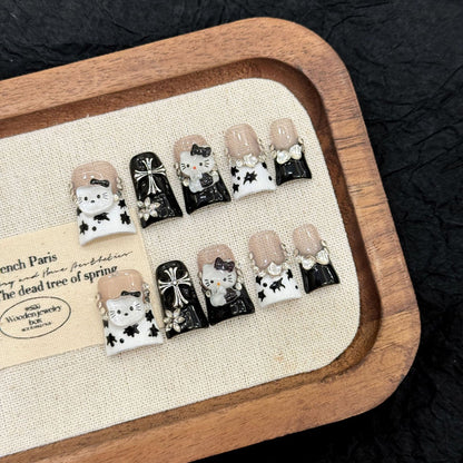Stand out with our handmade Black White Cat Cross Gothic Kawaii Flare Press On Nails.