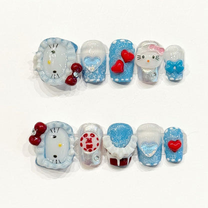 Adorable handmade coffin nails with Hello Kitty, red hearts & blue glitter - Kawaii charm, reusable - Applies in 15 minutes