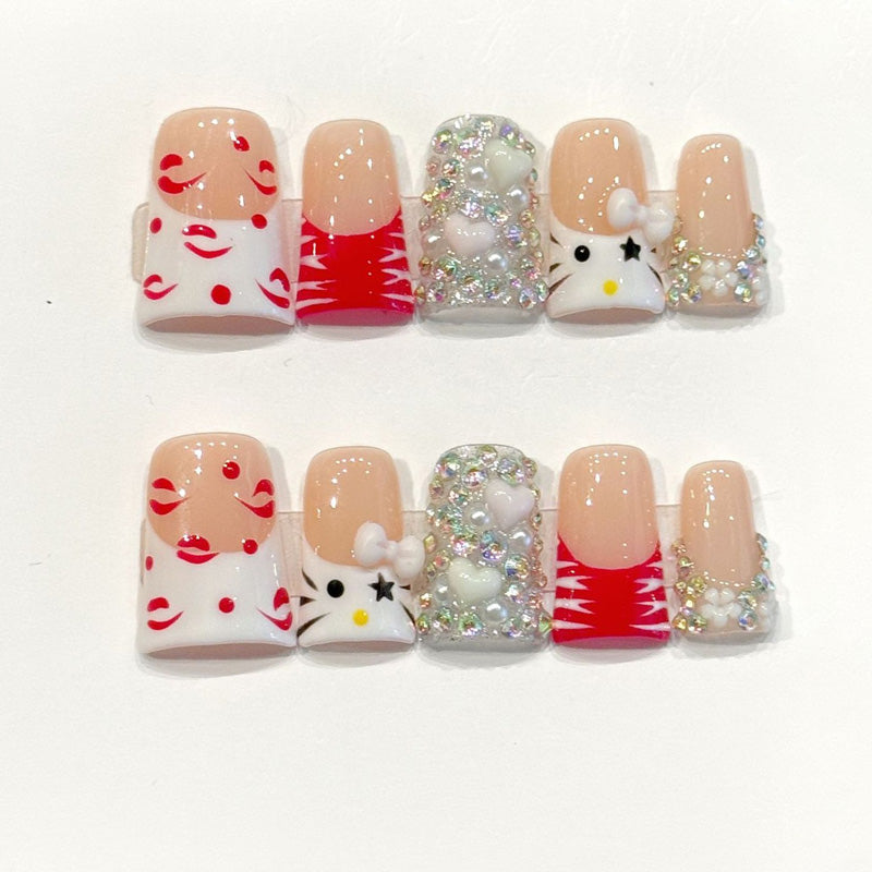 Adorable handmade duck nails with Hello Kitty character, red smiles & silver glitter - Festive kawaii holiday charm - Applies in 15 minutes