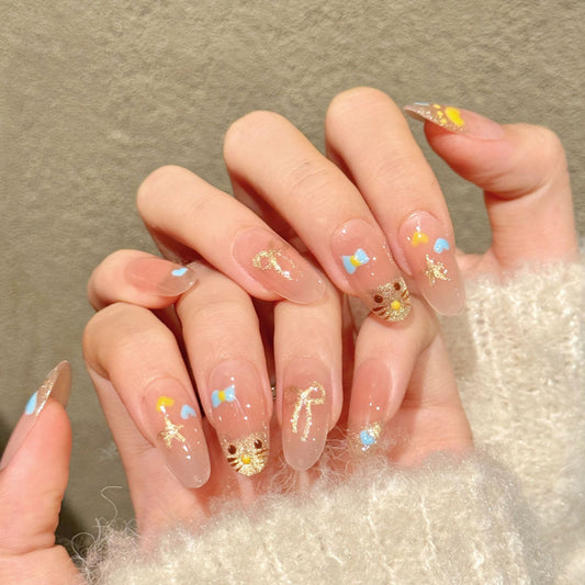 Adorable oval nails with cute bear, hearts, gold glitter & sweet gradient - perfect for kawaii bear heart gold glitter charm & playful style