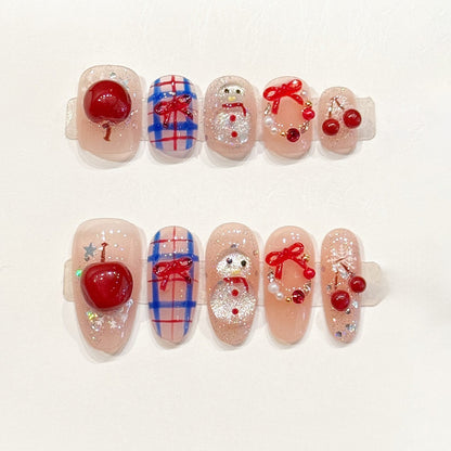 Adorable press-ons with 3D glossy cherries, glittery snowman & blue plaid - handcrafted kawaii Christmas nail art with red bows