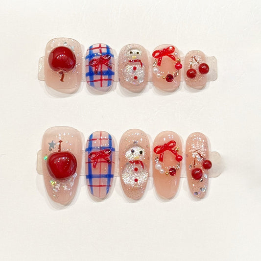 Adorable press-ons with 3D glossy cherries, glittery snowman & blue plaid - handcrafted kawaii Christmas nail art with red bows