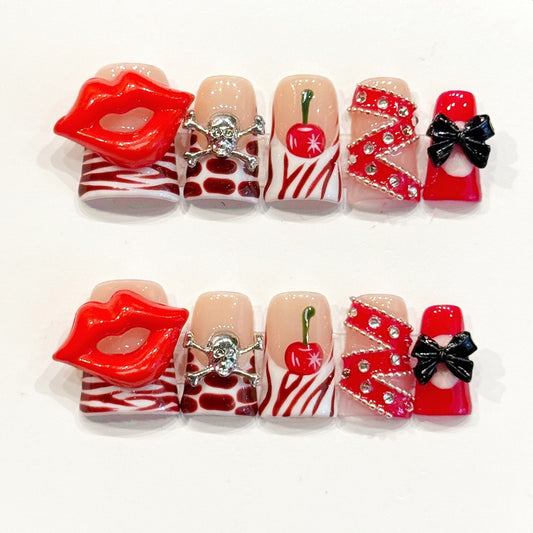 Bold handmade duck nails with 3D red lips, skull & cherry charms, rhinestone zigzag - Edgy glamour, reusable - Applies in just 15 minutes