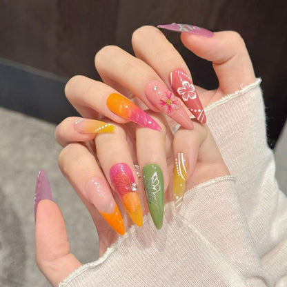 Bold sunset stiletto false nails featuring multi-color ombré, dimensional flowers & pearl dots - dramatic 10-piece vacation set