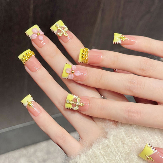 Charming duck press-on nails featuring cross charms, starburst & floral details - Spiritual elegance at home - Complete set of 10