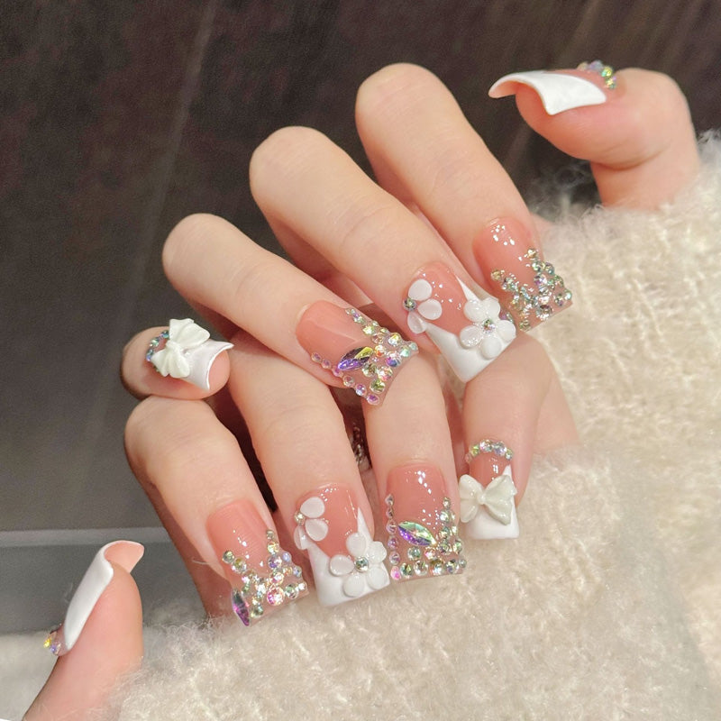 Charming duck press-on nails featuring white bows, rainbow rhinestone clusters & florals - Romantic salon art at home - Set of 10 nails
