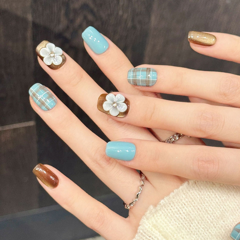 Charming short squoval nails with timeless plaid design, gentle blue, rich brown & sculpted flower - vintage-inspired collection