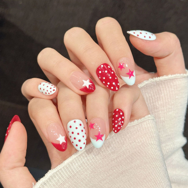Classic red, white & blue almond nails with sculptural stars, vintage dots & sparkling accents - American pride nail collection