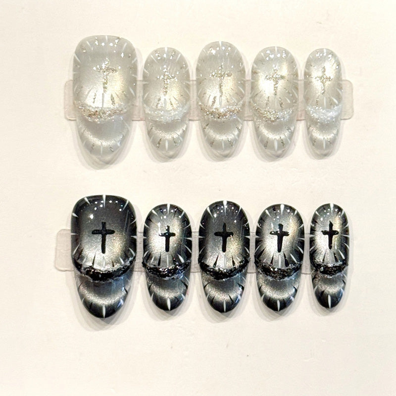 Divine handmade oval nails with radiant silver gradient & black cross silhouettes - Spiritual elegance, reusable - Applies in just 15 minutes"