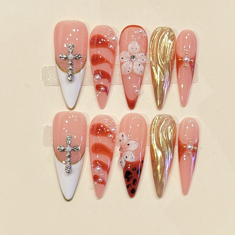 Dramatic extra-long stiletto press-ons featuring crystal crosses, molten gold chrome & marble art - handcrafted luxury statement nails