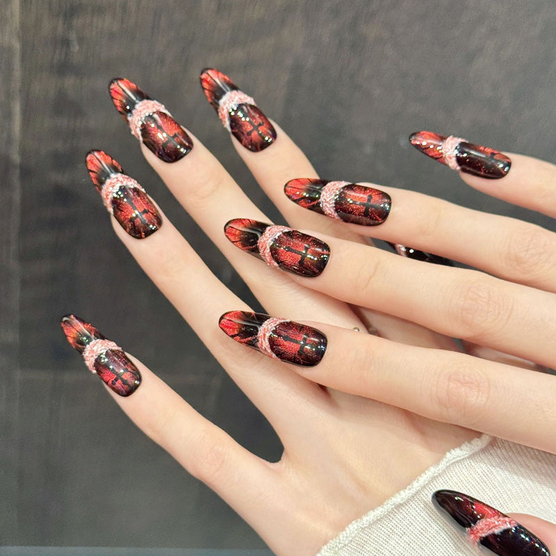 Dramatic stiletto long nails with red glitter, pink lace border & glossy black - perfect for red glitter pink lace elegance & bold glamorous style