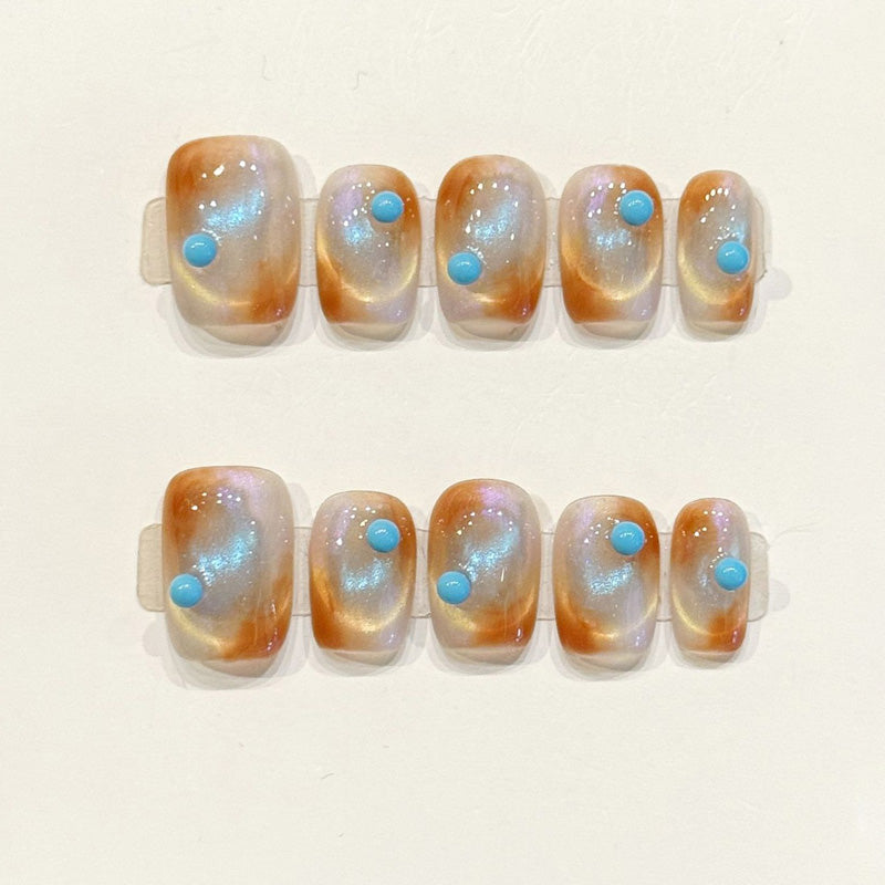 Dreamy handmade squoval nails with sunset jelly base, turquoise gemstones & iridescent shimmer - Boho desert magic - Applies in 15 minutes