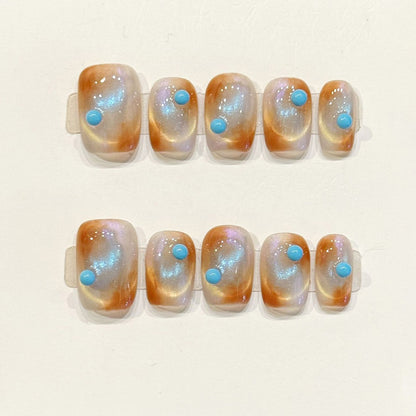 Dreamy handmade squoval nails with sunset jelly base, turquoise gemstones & iridescent shimmer - Boho desert magic - Applies in 15 minutes
