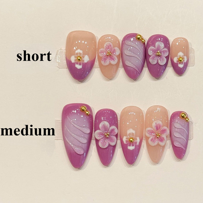 Dreamy peachy-purple ombré almond press-ons with 3D floral sculptures, textured waves & golden pearls - handcrafted sunset nails