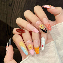 Artistic Mixed Media Almond Nails with Floral Embellishments