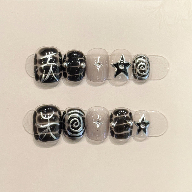 Edgy squoval short nails with spider web, silver spirals, black stars & glitter - perfect for gothic spider web star mystique & dark elegance