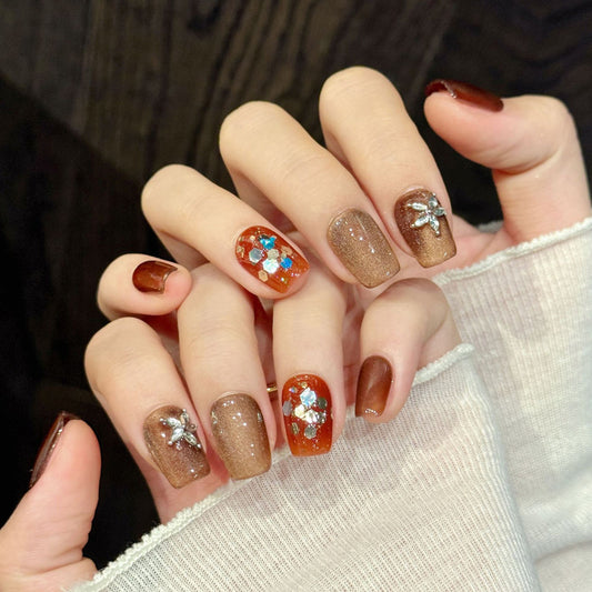 Elegant coffin short nails with silver flower, autumn shimmer, orange accent & crystals - perfect for autumn flower shimmer charm seasonal elegance