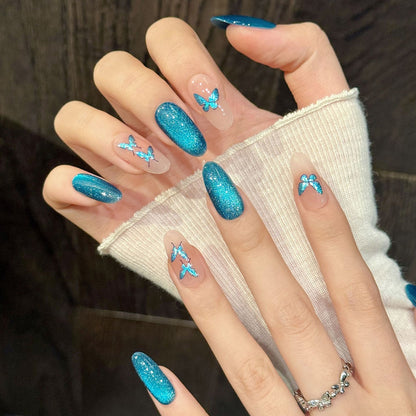 Elegant oval nails with teal butterflies, shimmer gradient & jelly base - perfect for teal butterfly shimmer gradient elegance & ethereal style