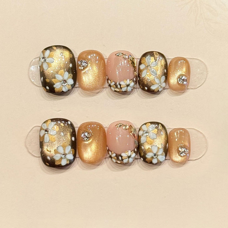 Elegant squoval short nails with 3D flowers, gold glitter, crystals & gradient - perfect for gold flower crystal glitter sophisticated charm style