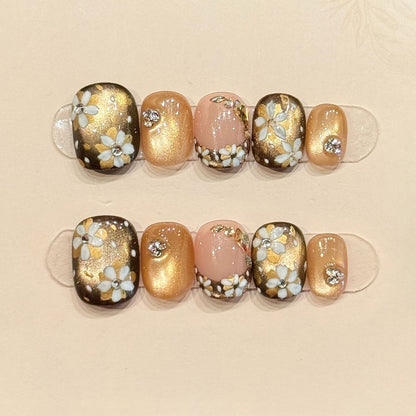 Elegant squoval short nails with 3D flowers, gold glitter, crystals & gradient - perfect for gold flower crystal glitter sophisticated charm style