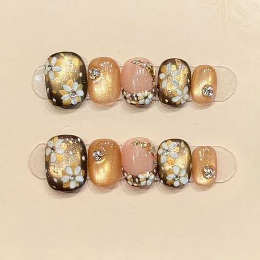 Elegant squoval short nails with 3D flowers, gold glitter, crystals & gradient - perfect for gold flower crystal glitter sophisticated charm style