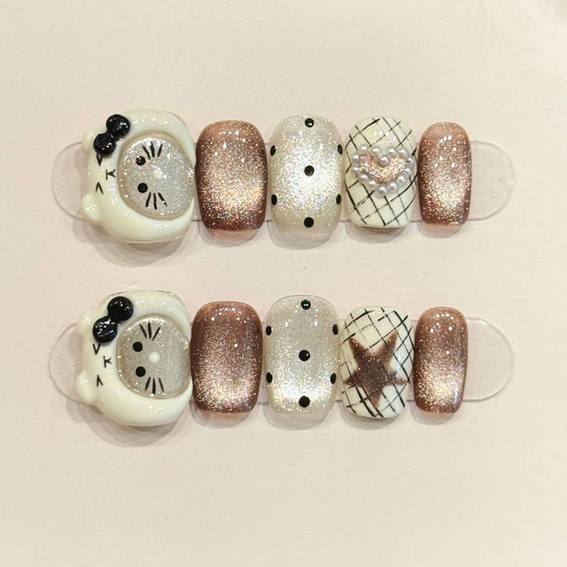 Elegant squoval short press-on nails with 3D bow, rose gold glitter, polka dots & grid patterns - perfect for chic polka dot elegance & timeless style