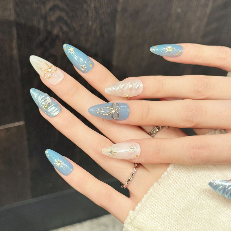 Enchanting almond press-on nails featuring iridescent shimmer, bow & moon charms - Whimsical salon art at home - Set of 10 nails