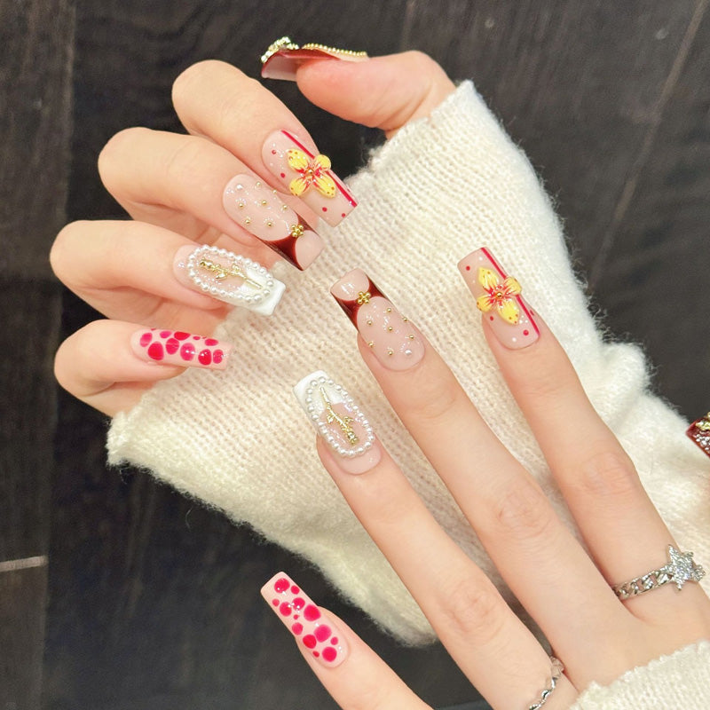 Exquisite squoval press-on nails featuring pearl roses, bow charms & gold details - Salon luxury at home - Complete set of 10