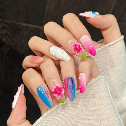 Eye-catching jelly almond nails with dimensional floral resin, gradient effects & bright colors - cheerful translucent nail collection